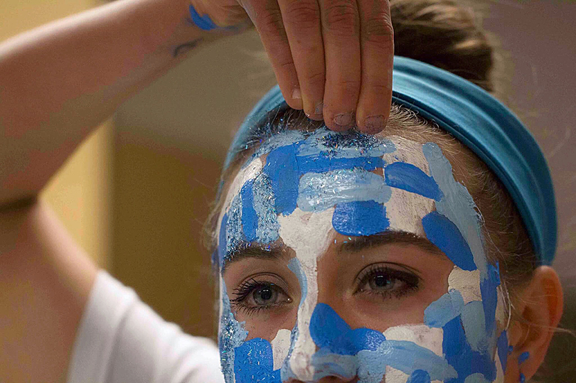 UNC senior shows school pride, raises awareness for eating disorders using glitter