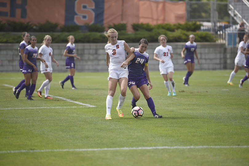 Sydney Brackett powers through Bucknell’s defense for both goals in 2-0 Syracuse win