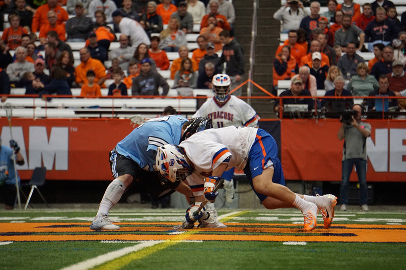 Syracuse uses any means necessary to win faceoffs