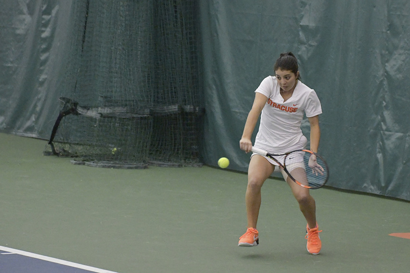 Behind Miranda Ramirez’s 1-handed backhand